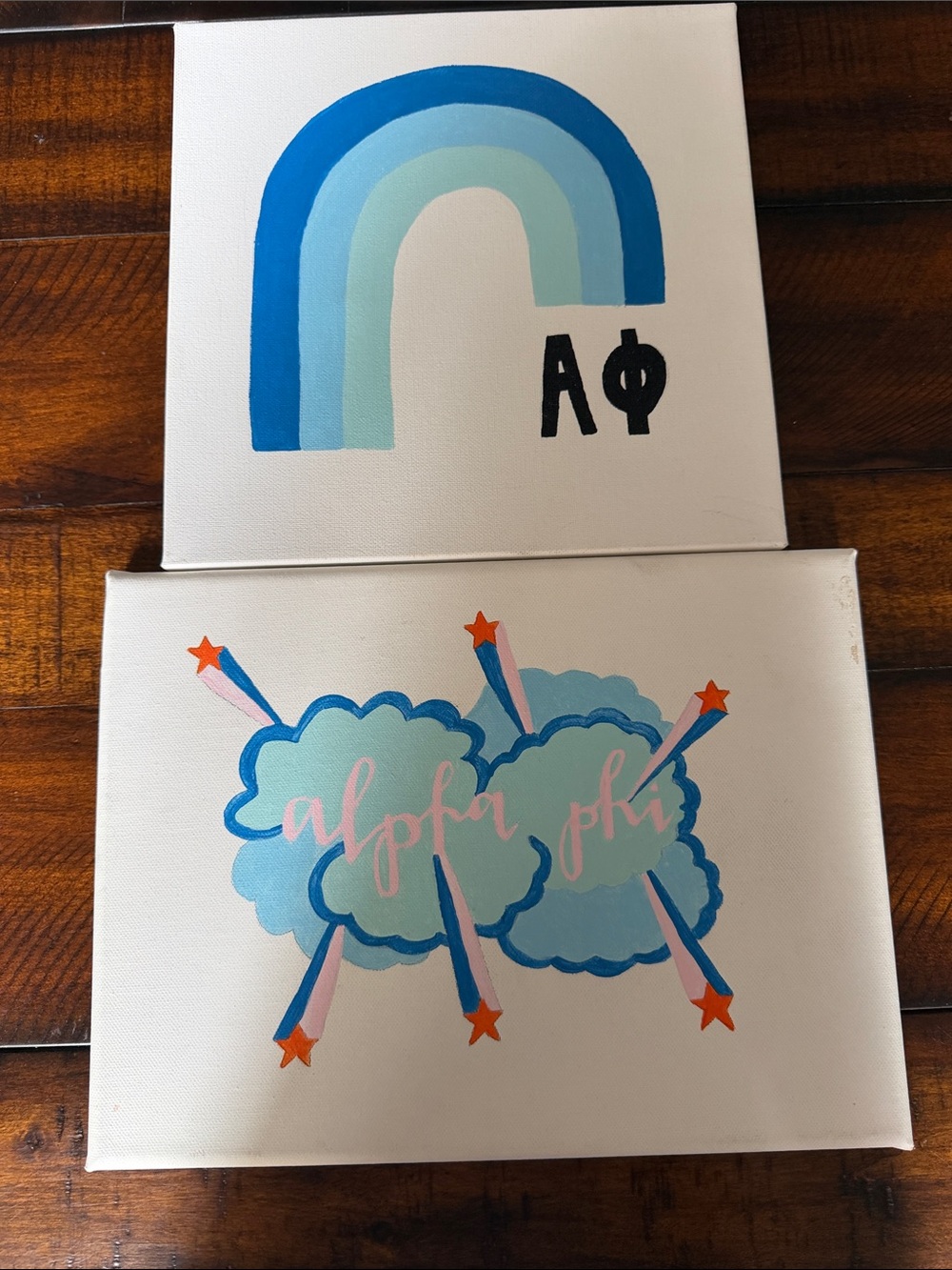 Hand-Painted Duo: Cloud Burst & Blue Rainbow Canvases Alphi Phi